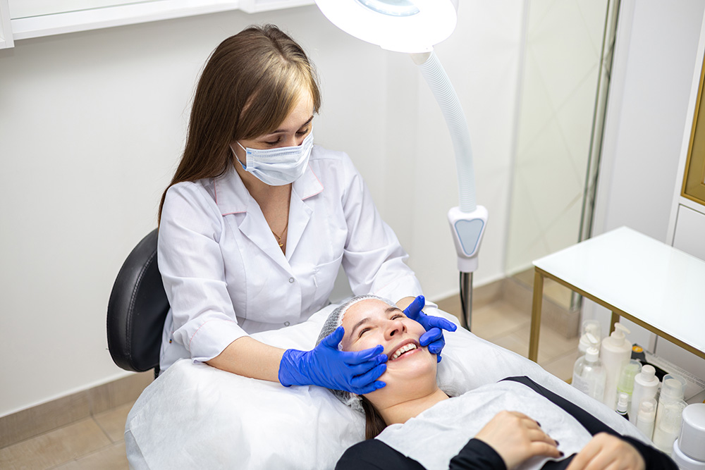 Board-certified dermatologist providing skin care consultation